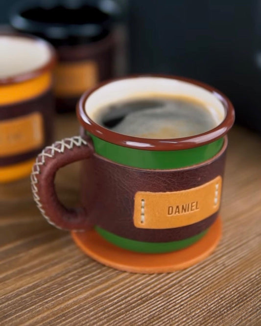 Name-stamped leather mugs lined up, trade show swag made in Las Vegas