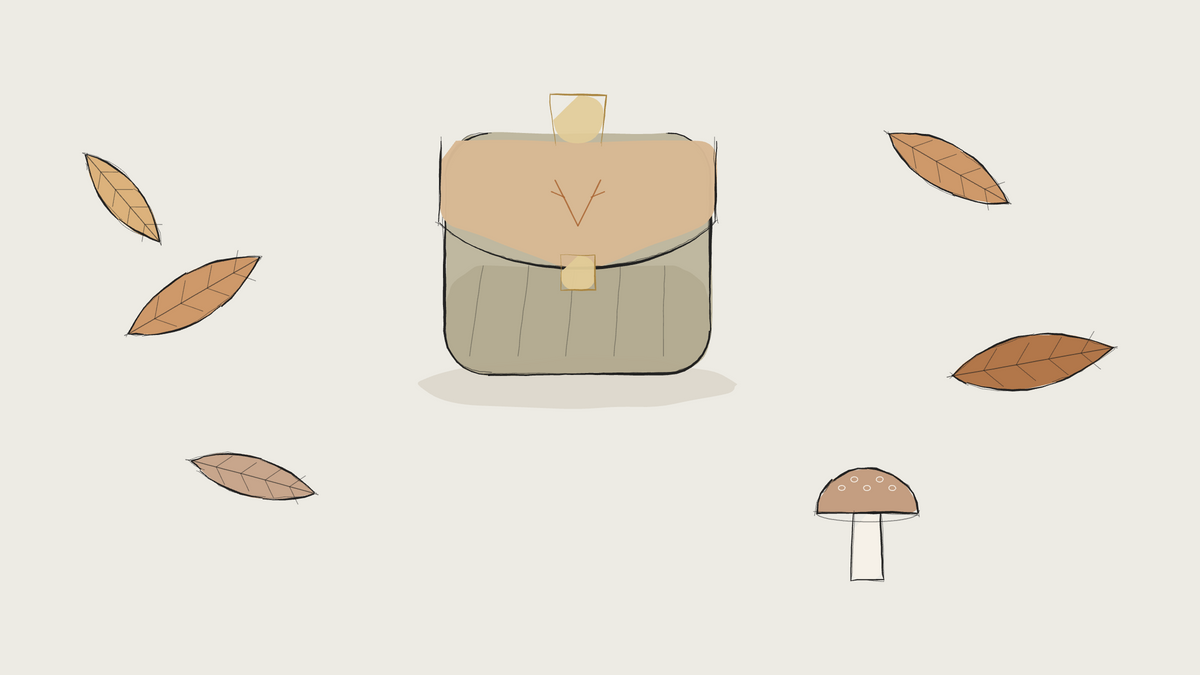 Ink sketch of a foraging pouch among autumn leaves and a mushroom