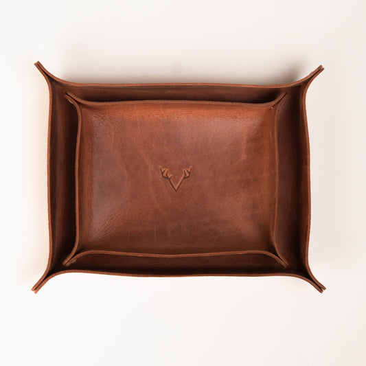 Full-grain vegetable-tanned leather valet tray showing natural patina