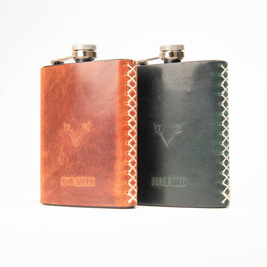 Hand-stitched leather hip flask wraps stamped with names, made in Las Vegas